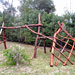 wooden jungle gym with swings